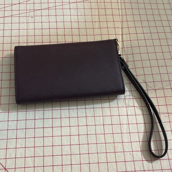 Never used Kate Spade wine color wristlet with phone holder and wallet - Picture 2 of 6